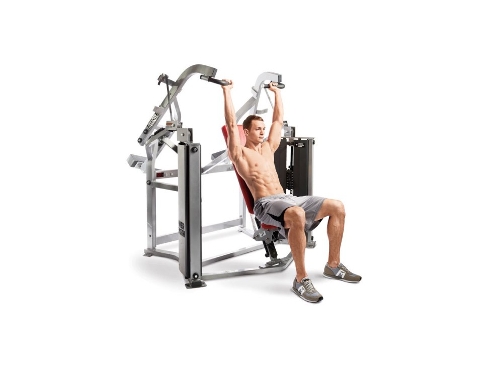 Жим в тренажере сидя Technogym