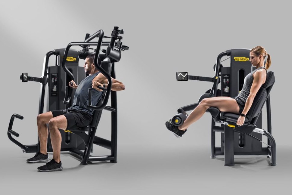 Technogym жим плеч